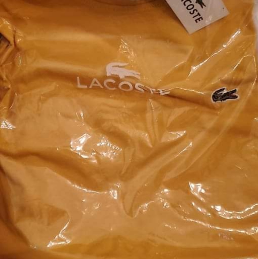Gold Lacoste t shirt